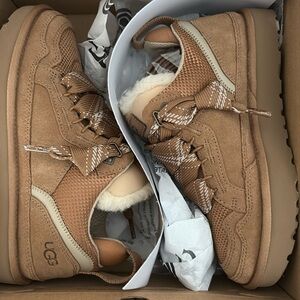 UGG LOWMEL sneakers women size 7

New with tags